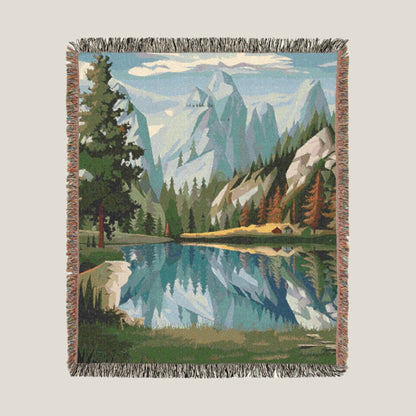 Alpine Reflection Mountain Woven Throw Blanket with a serene mountain landscape and reflection in a calm lake. Ideal outdoor blanket for hikers and nature lovers.